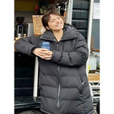 Black hooded parachute jacket