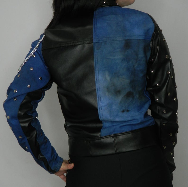 Black leather and deep blue distressed denim studded moto style jacket
